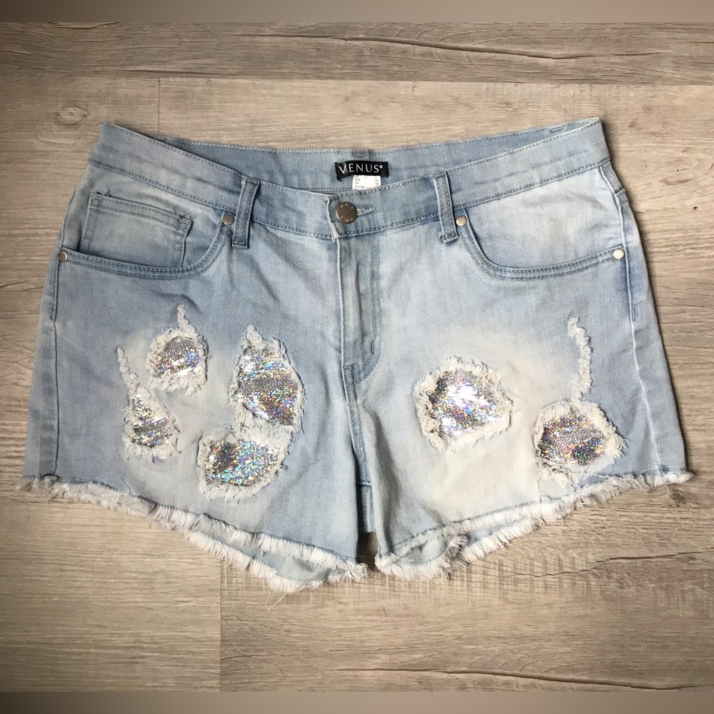 Women’s Venus shorts with sequin patch accents. Size 12.